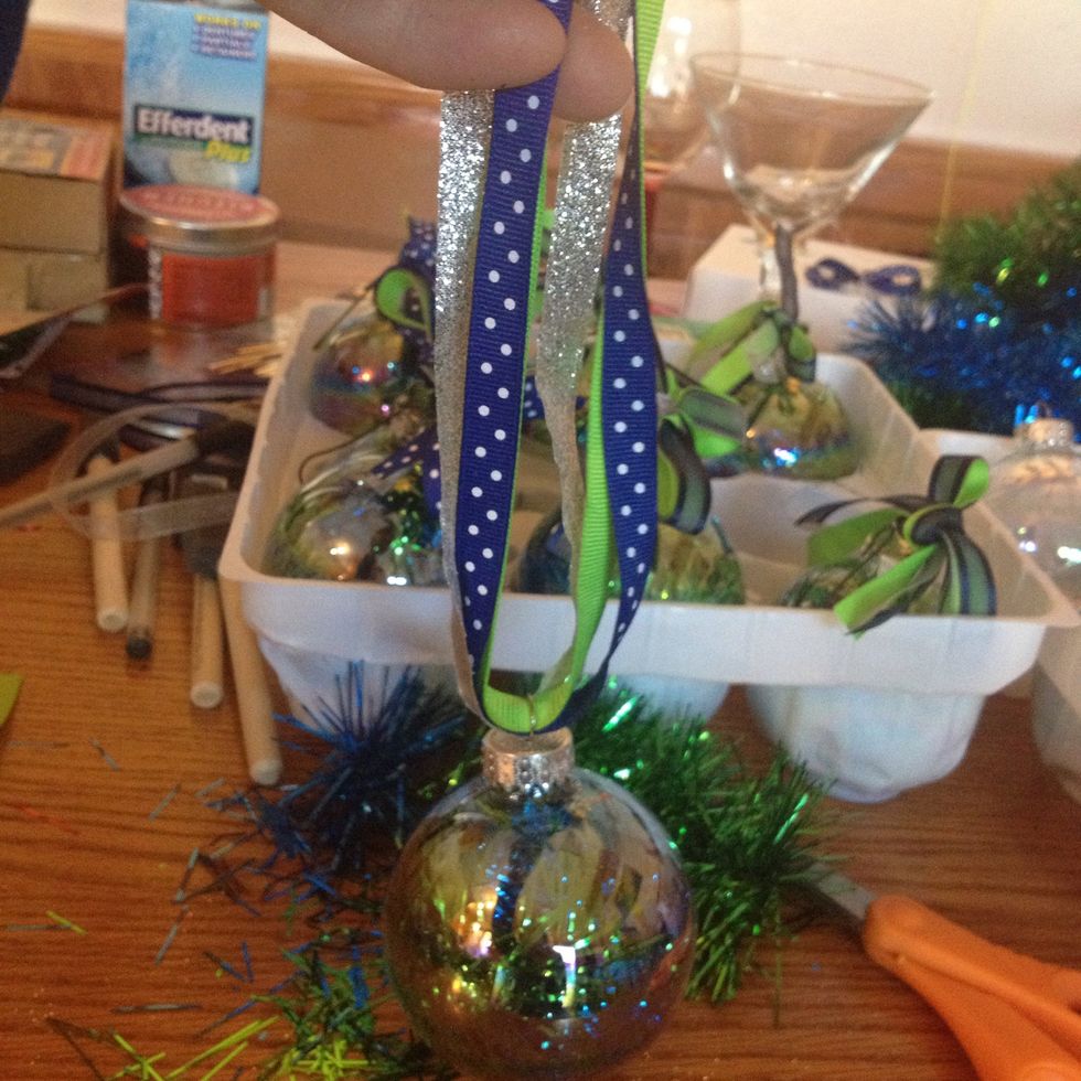 Make sure the ribbon is an even length on both sides.