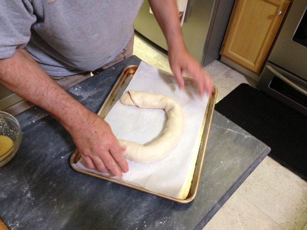 Make sure the seam is on the bottom and shape the loaf into a horseshoe.