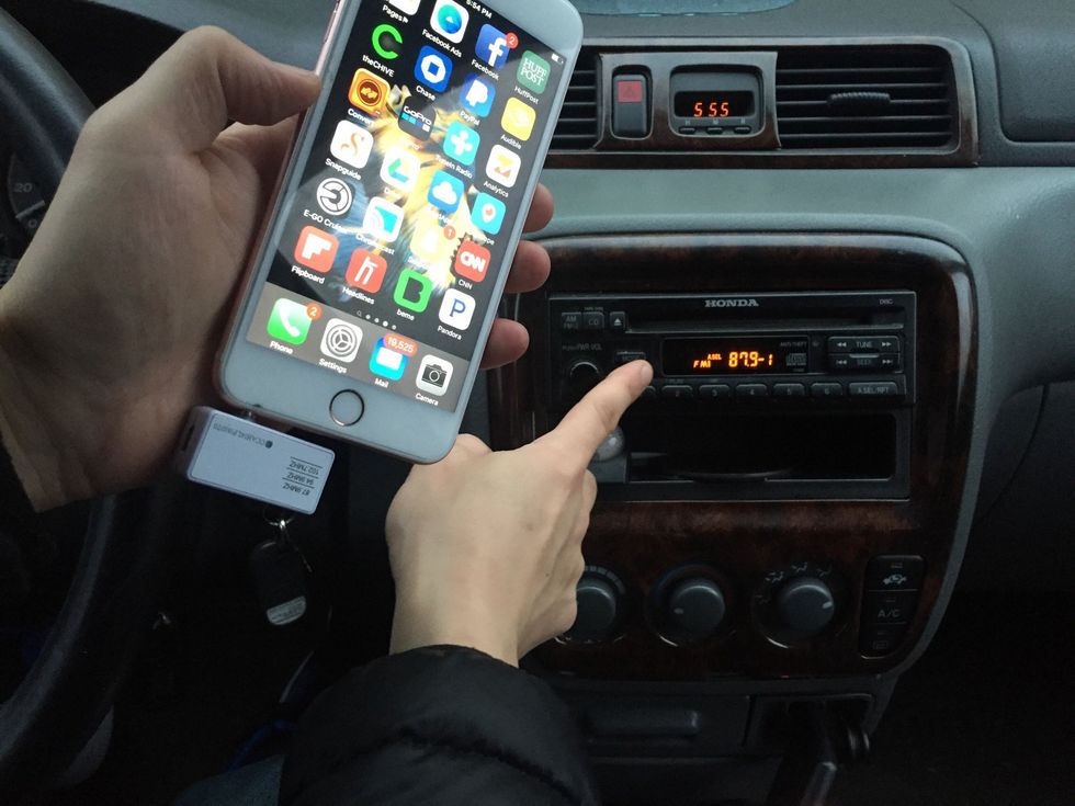 Make sure the setting is at the 87.9FM on the car radio as well as the setting on the transmitter