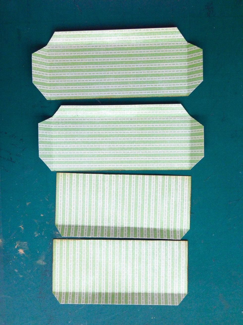 Make sure they do fit well to the sides of the box, trim and adjust when necessary... Once done, angle off the bleeds as shown...