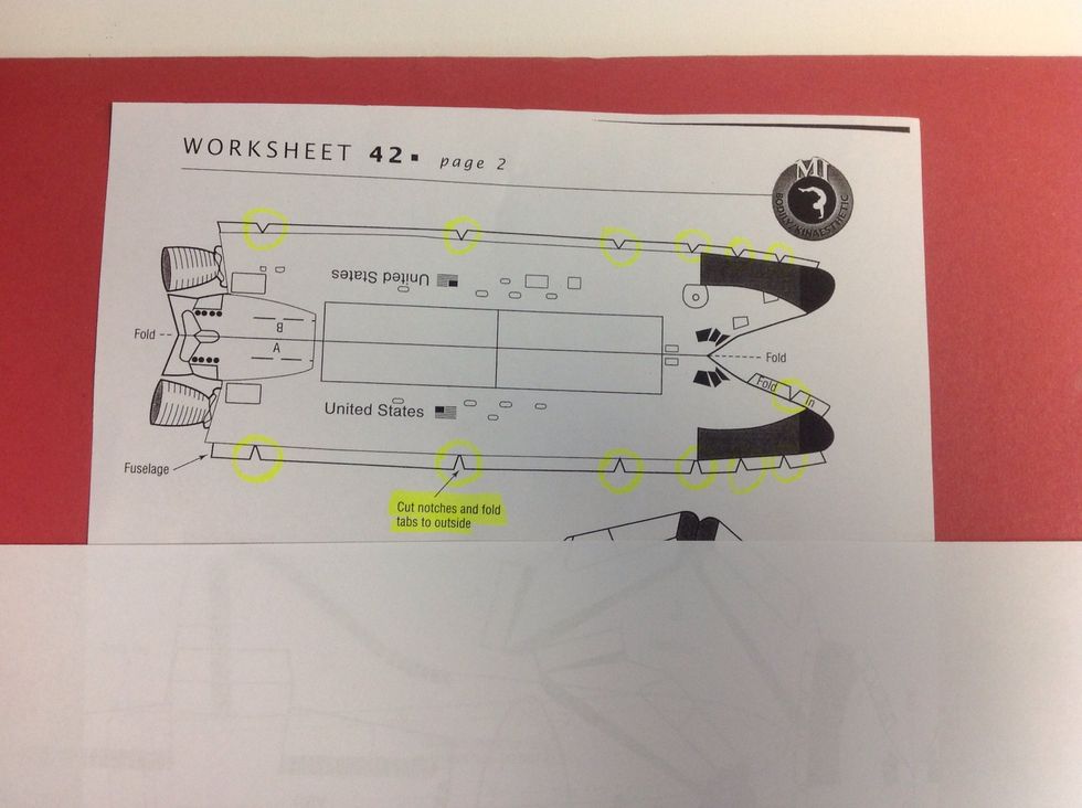 Make sure to cut out the 13 notches (as highlighted above) on the fuselage (top piece of model)