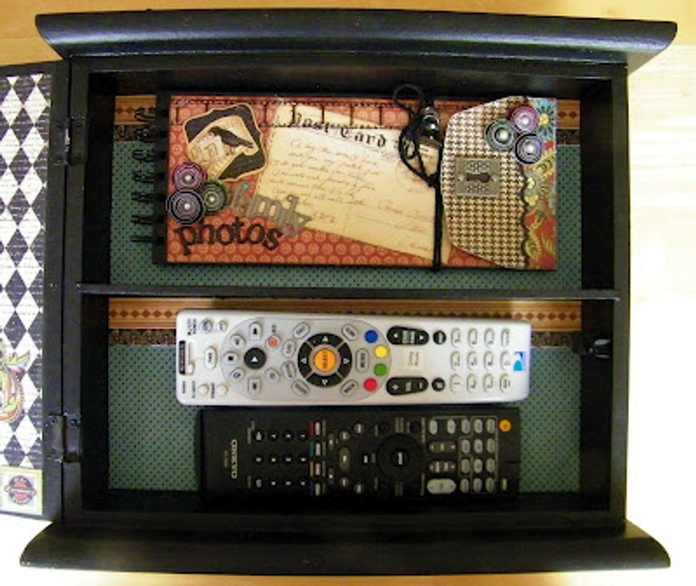 Make sure to decorate the inside of the medicine cabinet box so it will look like a finished piece before you add your remotes and also maybe a mini album.