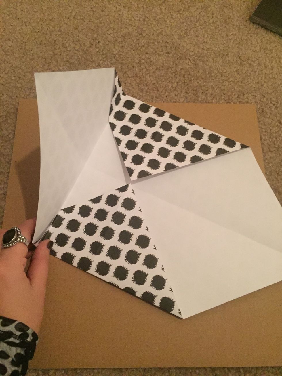 Make sure to have the fold overlap the previous two folds as demonstrated in the photo.