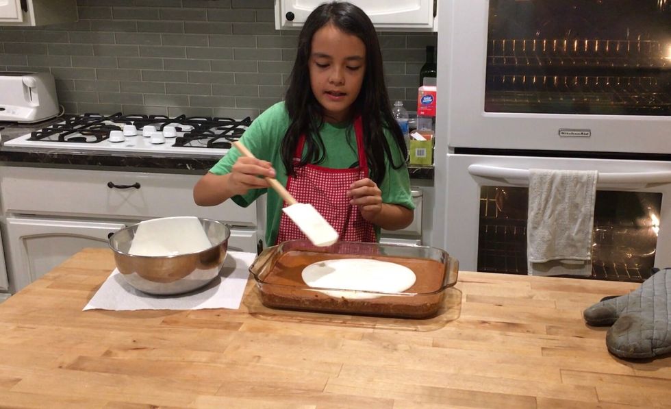 Make sure to not poke the pumpkin filling while spreading out the sour cream topping.