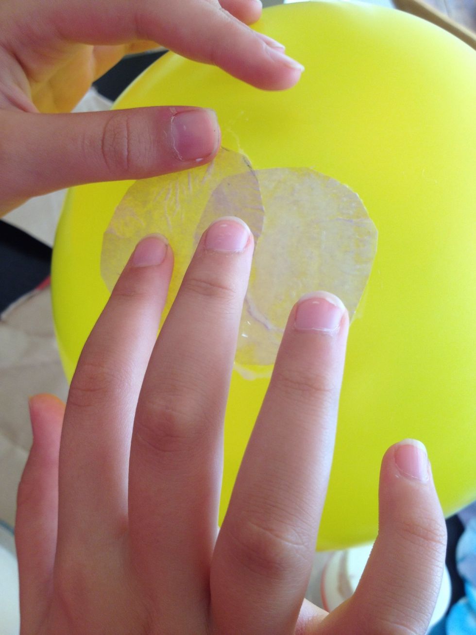 Make sure to overlap the tissue pieces as you add them.