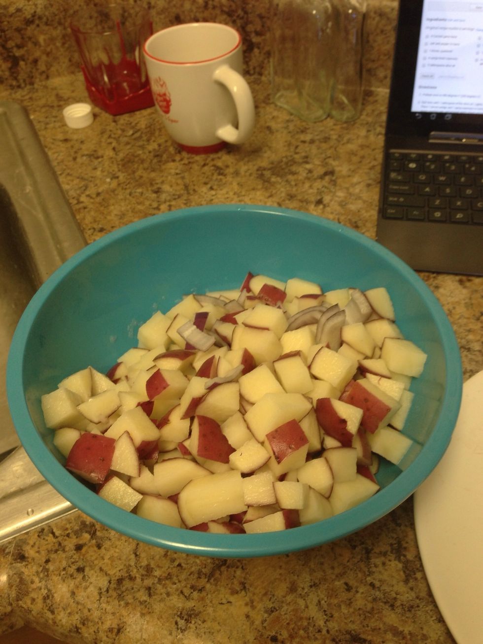 Make sure to rinse the potatoes well and put in a bowl with the onions.