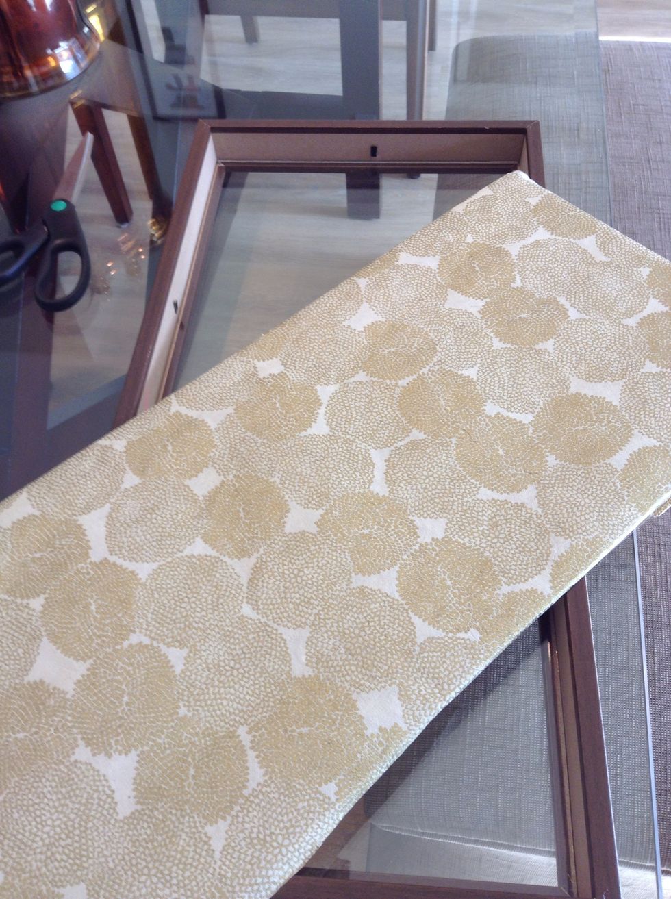 Make sure to smooth out the paper and adjust tape if needed.