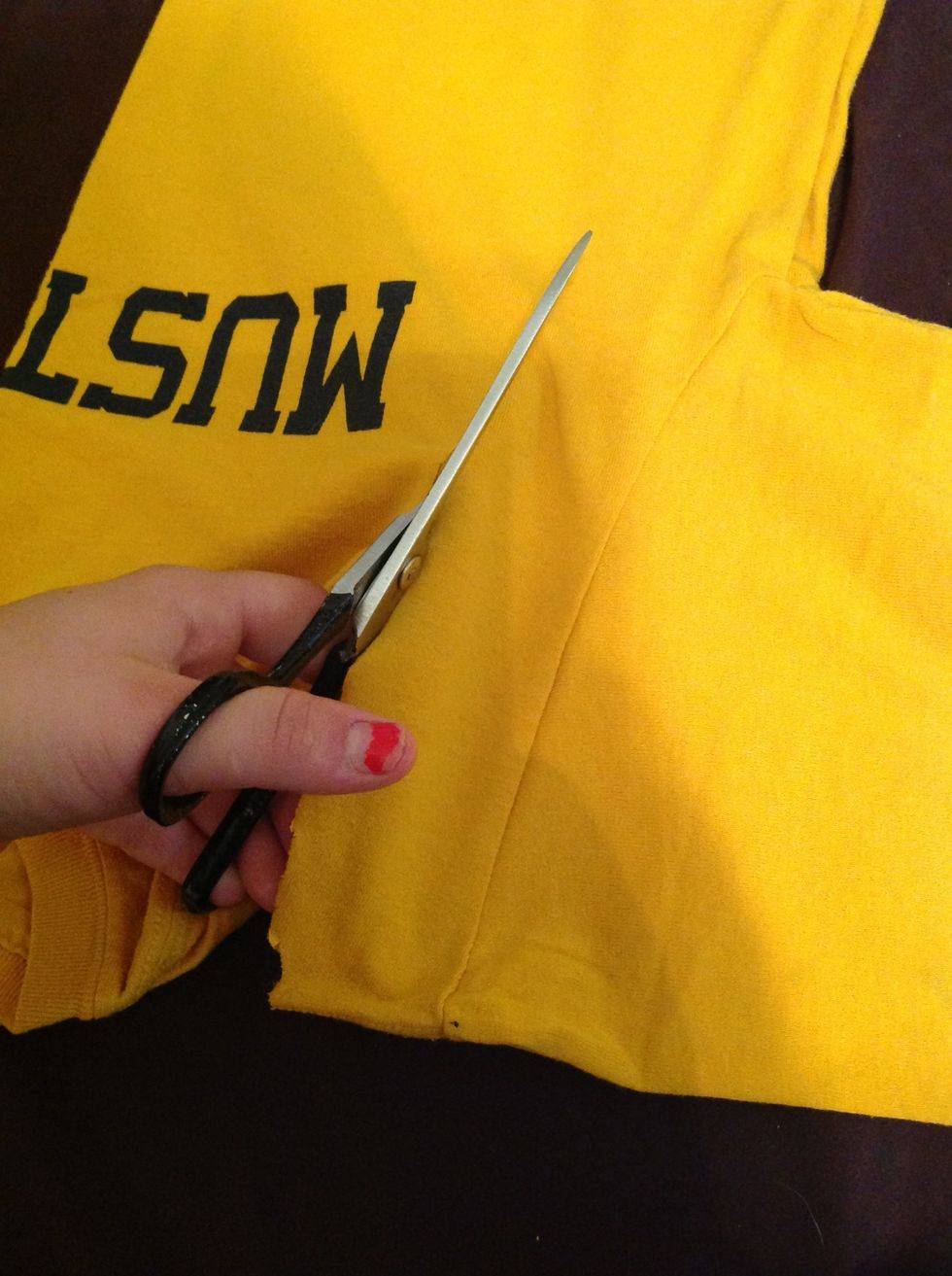 Make sure to try and keep an equal distance from the cut to the seam as your cutting