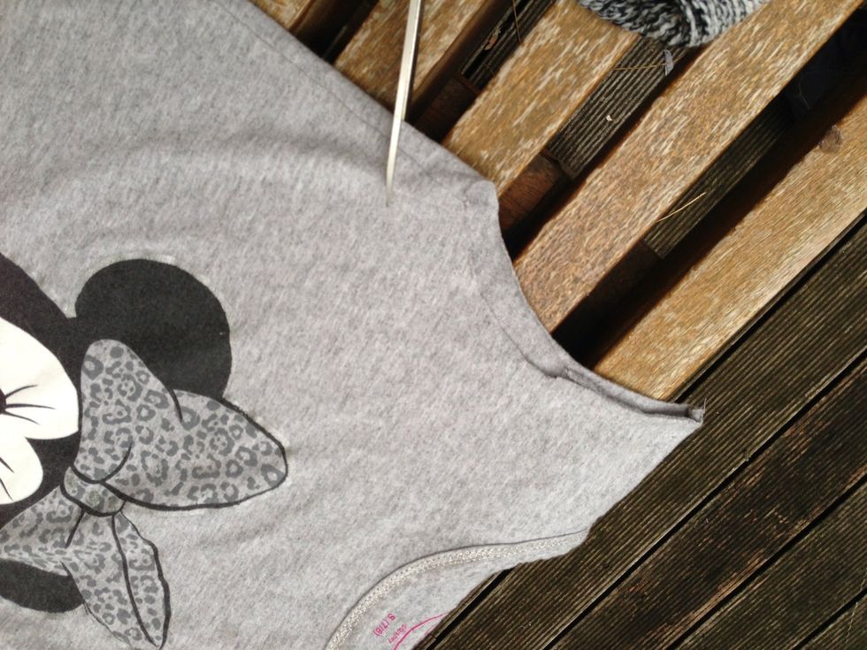 Make sure to try the T-Shirt on. If you don't like how the sleeves look, cut it more.