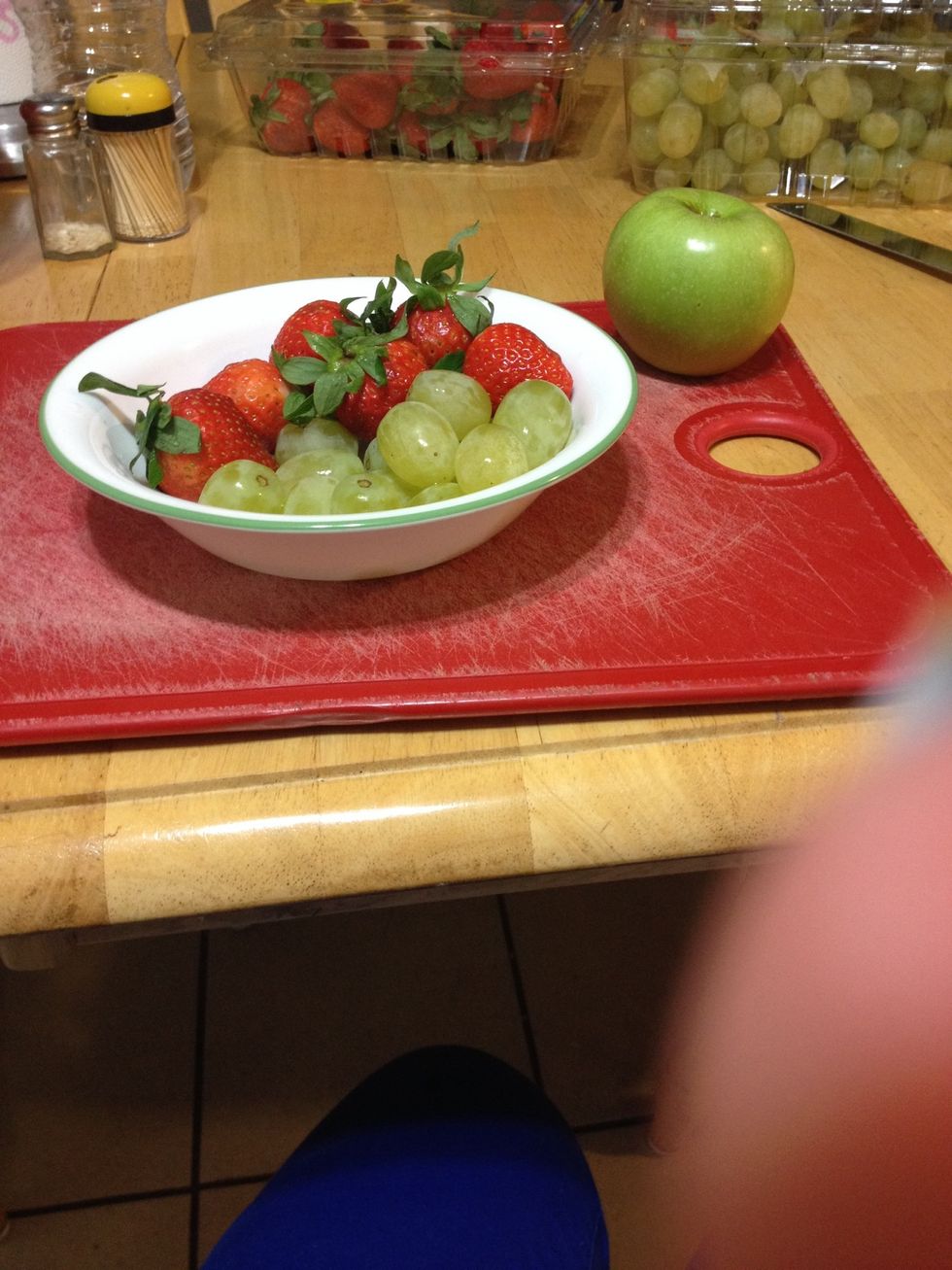 Make sure to wash the strawberrys, grapes, and the apple! Excuse my finger