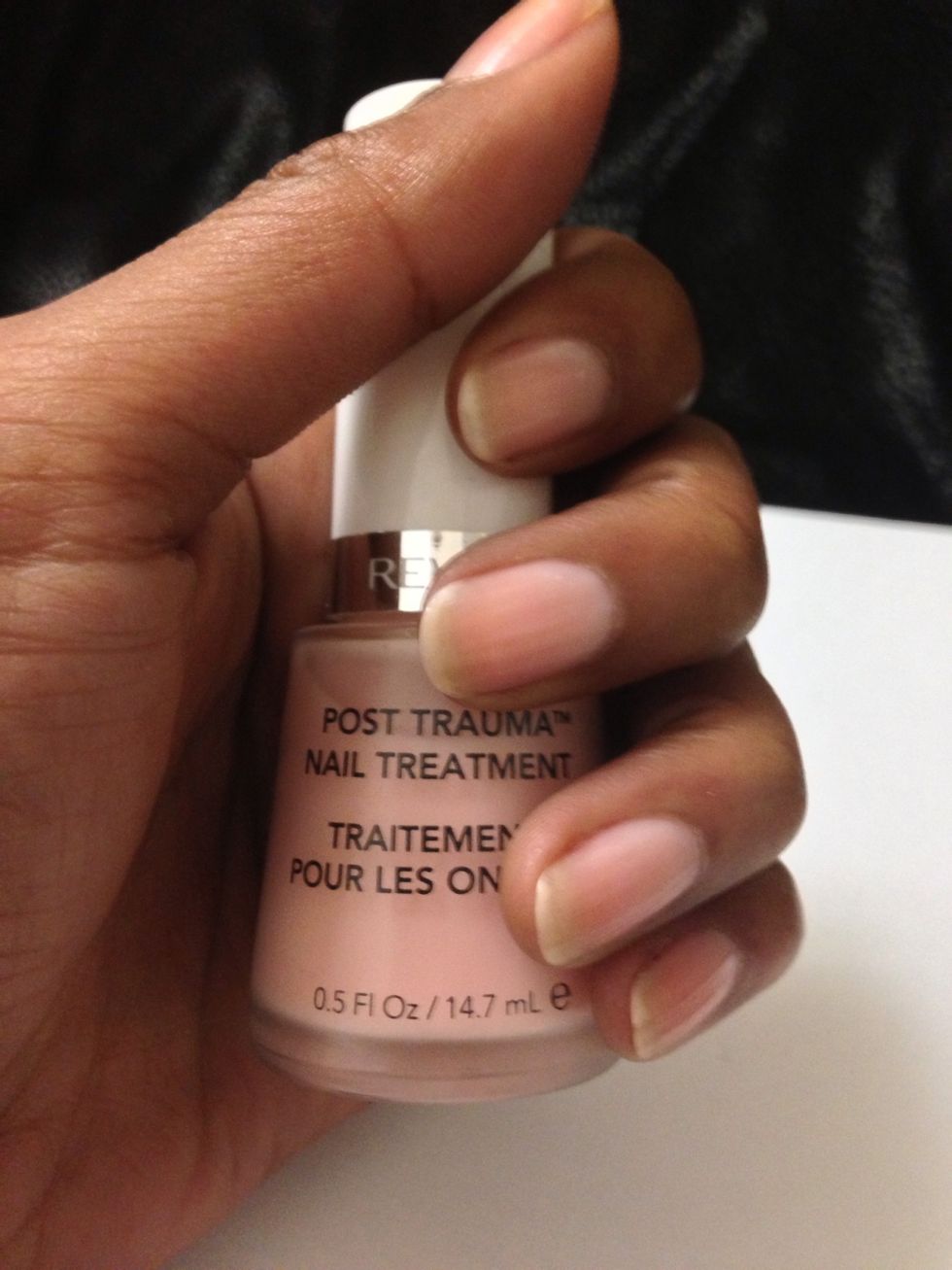 Make sure you clean, shape, & buff before you begin! Add your base coat. I'm using Revlon's post trauma base coat. It helps to fill in any lines or ridges and strengthens.
