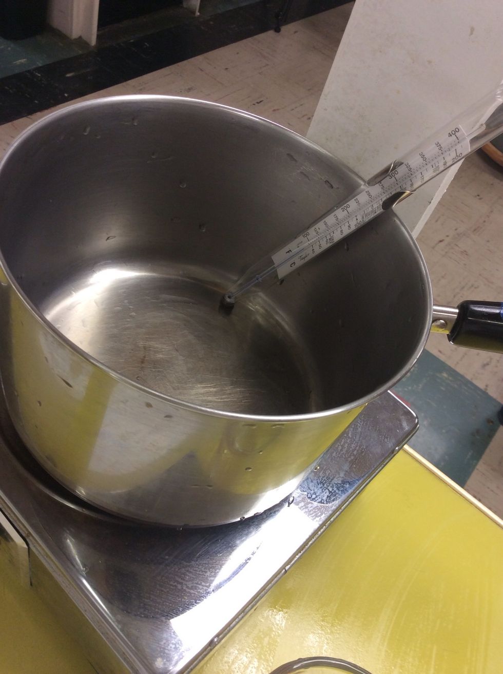 Make sure you have everything ready ahead of time, including lollipop sticks, a greased lollipop mold, and hopefully a Silpat for any extra candy.