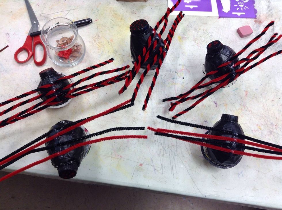 Make sure you have the right amount of legs! Eight! Excuse our beat up table, it has seen a lot of art projects.