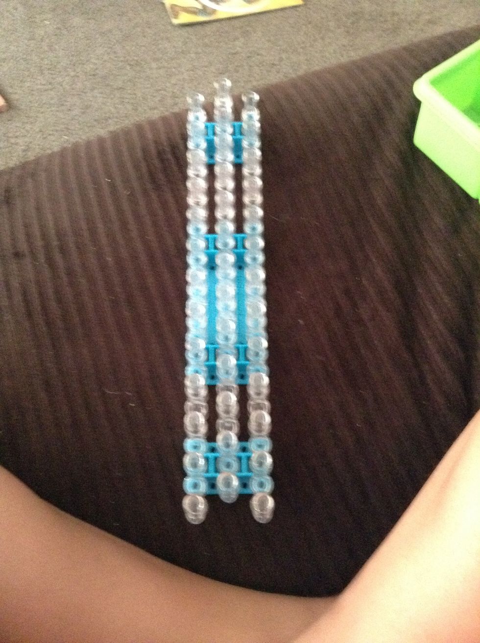 Make sure you have your loom with the arrows pointing away from you.