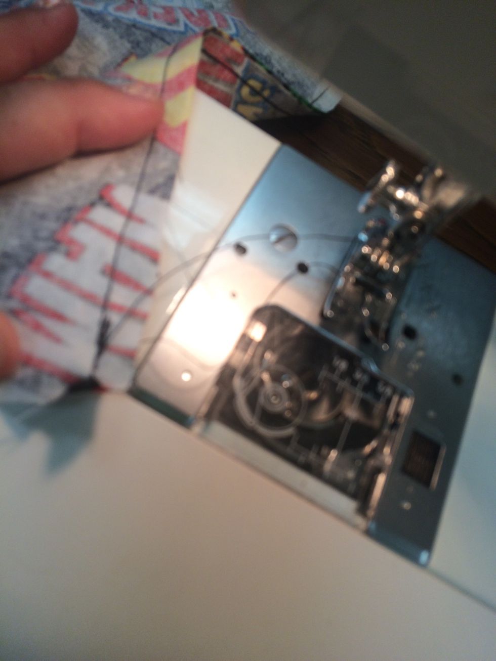 Make sure you leave the bottom open. ONLY SEW ALONG THE SIDE. Trim threads.