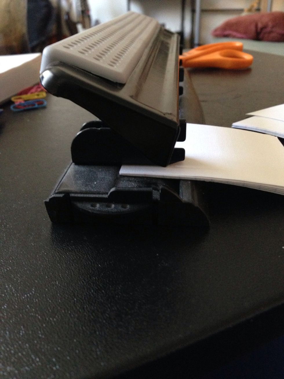 Make sure you push the cards all the way to the back of the hole punch. If you don't you may end up with the hole too close to the edge which is no bueno!