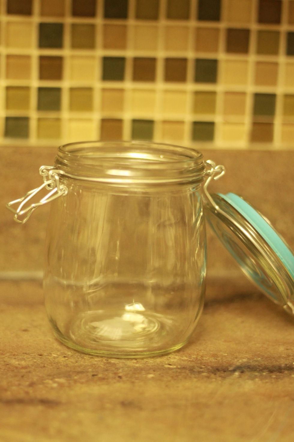 Make sure you use a clean jar with a tight fitting lid (these were at my local dollar store). Also a wide mouth jar helps get everything even... You'll see...