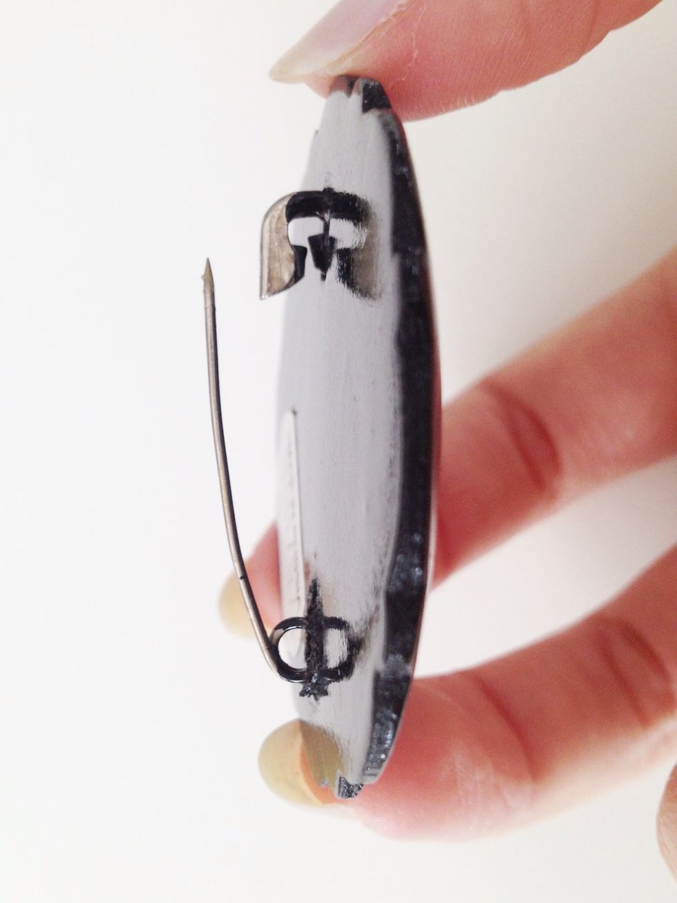 Make sure your brooch has a pin or clip attached to the back.