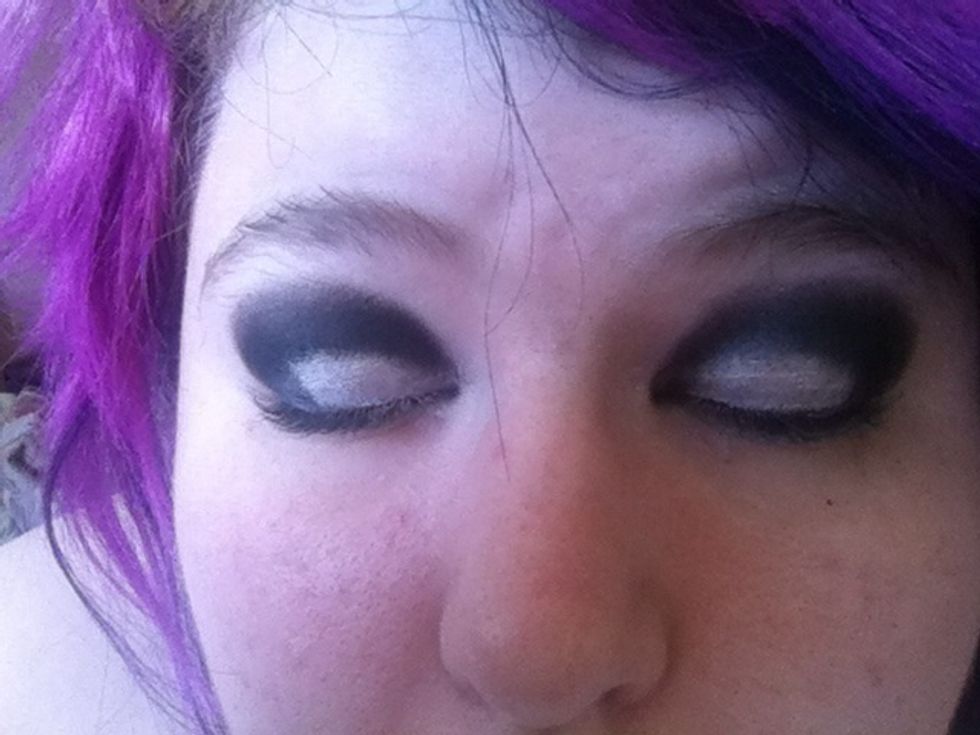 Make sure your lines are sharp and both sides are even. Now add your white powder eyeshadow on top of your cream base. This will make it pop :).