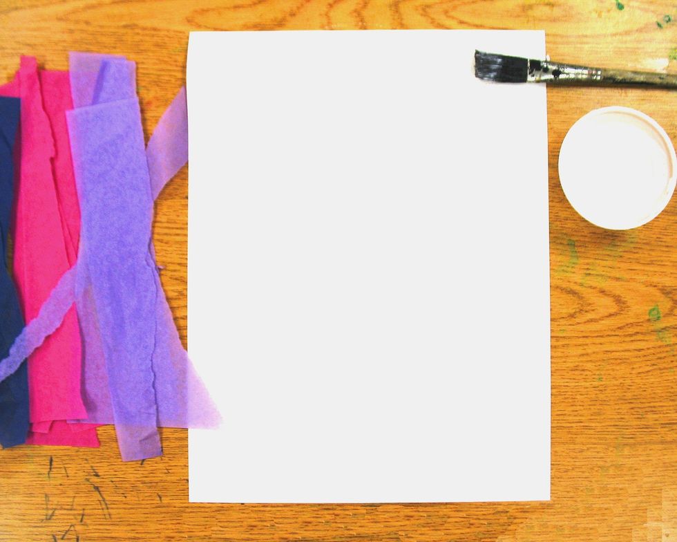 Make sure your name is on the back of the 8x10 piece of paper and flip to the front. Turn paper vertically. Use paintbrush to spread glue horizontally across the top of the paper.