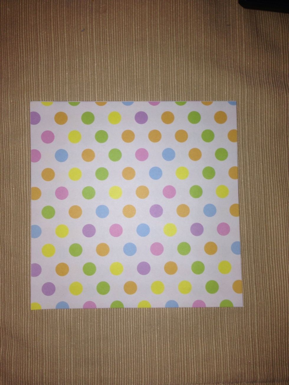 Make sure your paper is square and patterned on both sides. It can be any size and any kind of paper. I find that cardstock works best and went with 6" x 6".