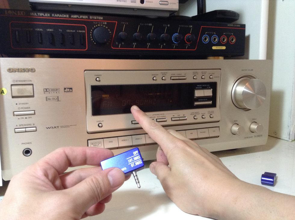 Make sure your radio on your home entertainment center set at the preset or tune in at 87.9 FM matching the setting on the music transmitter.