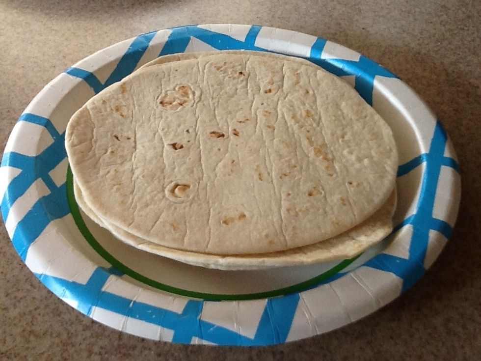 Make sure your tortillas are warmed and softened. I use flour, but you can use corn tortillas if you like. Homemade are even better.