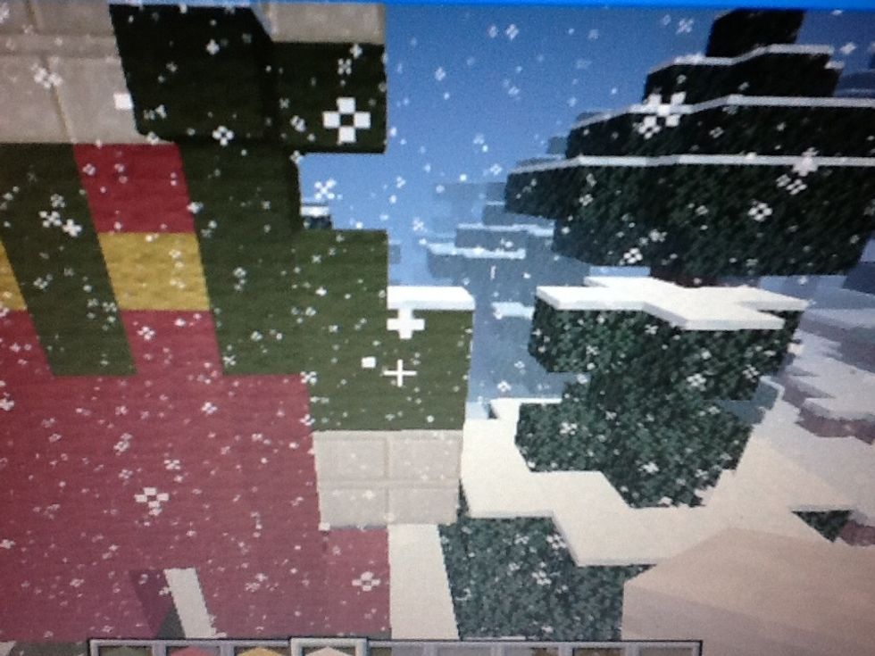 Make the arms with green wool and smooth sandstone