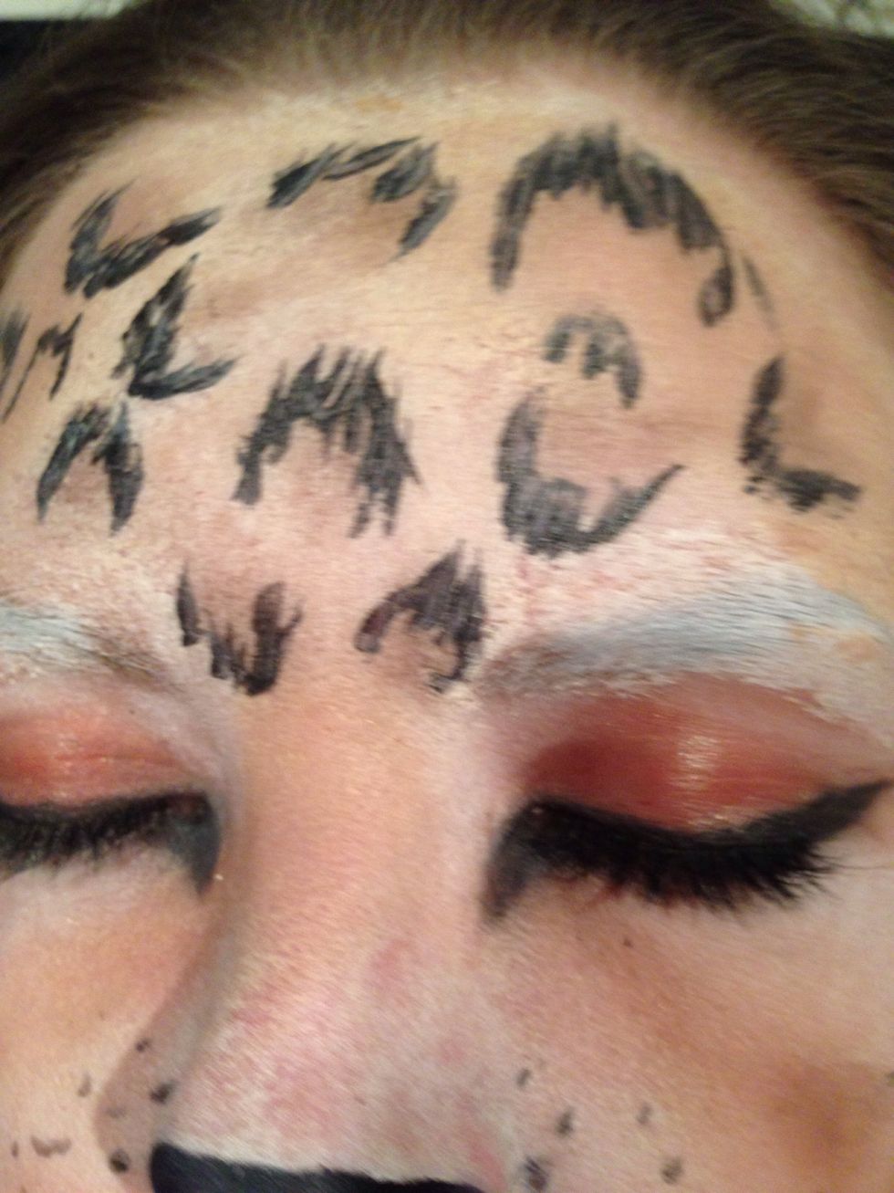 Make the black line go a bit down towards you nose and up towards your brow