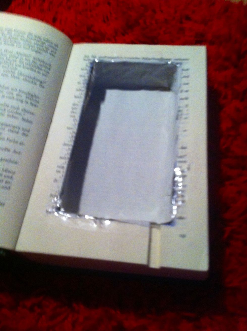 Make the compartment as deep as you need it to be, make sure not to go all the way to the end of the book, otherwise the compartment won't be that stable.