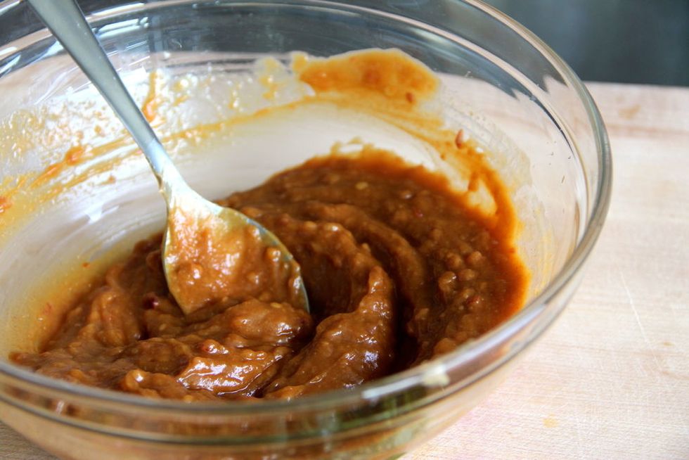 Make the dressing by combining the peanut butter, sesame oil, canola oil, soy sauce, lime juice and chili garlic sauce in a bowl. Microwave 1-2 minutes and stir until combined.