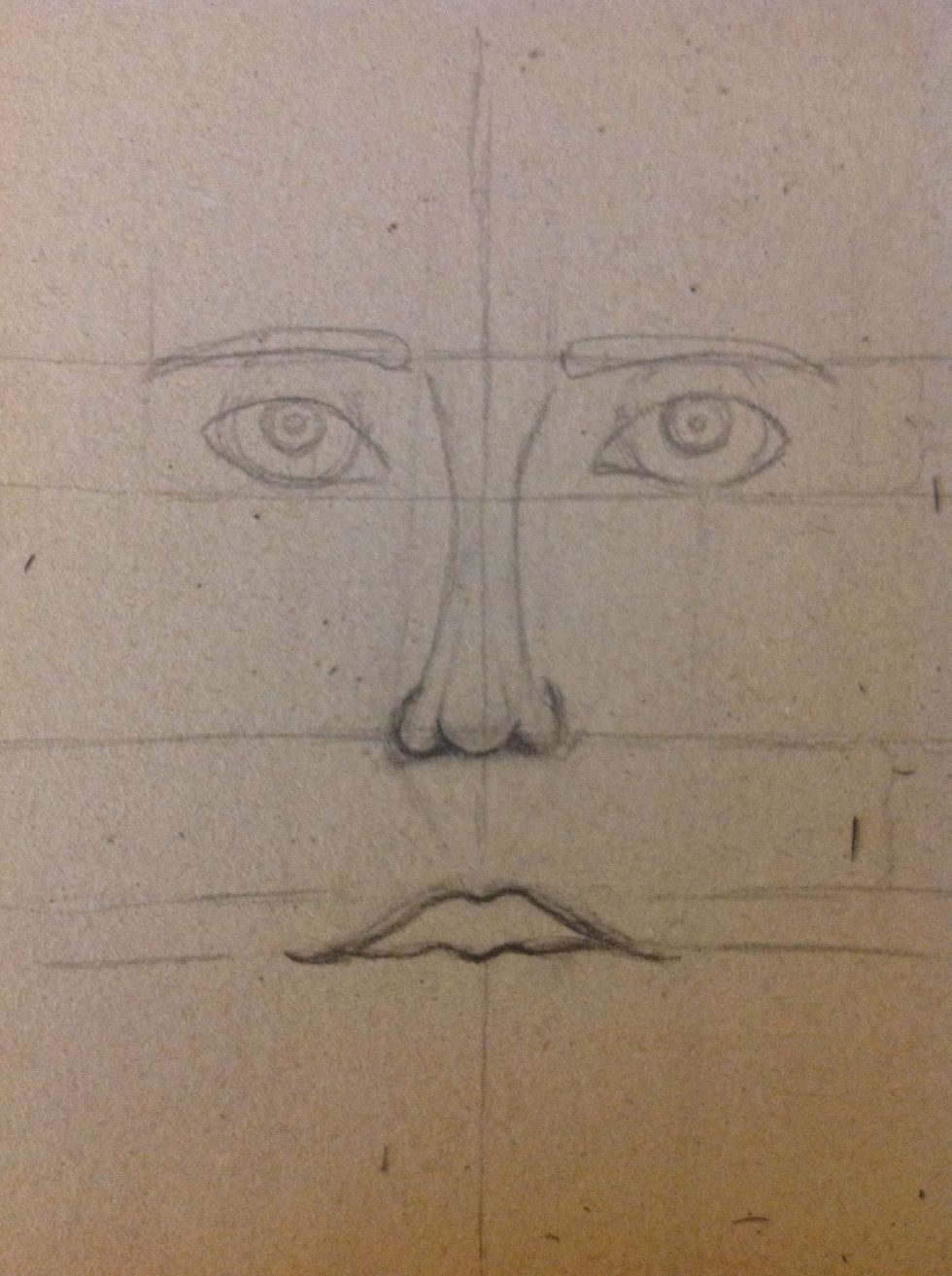 Make the lip of the top as you wish. I like a full lip. Erase the vertical lines of the eyes and the mouth.