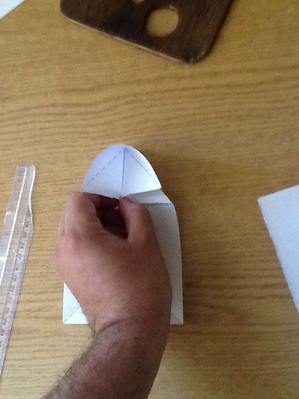 Make the middle touch each other.. Use two hands for each side (I'm using the other hand to hold the iPad ;) )