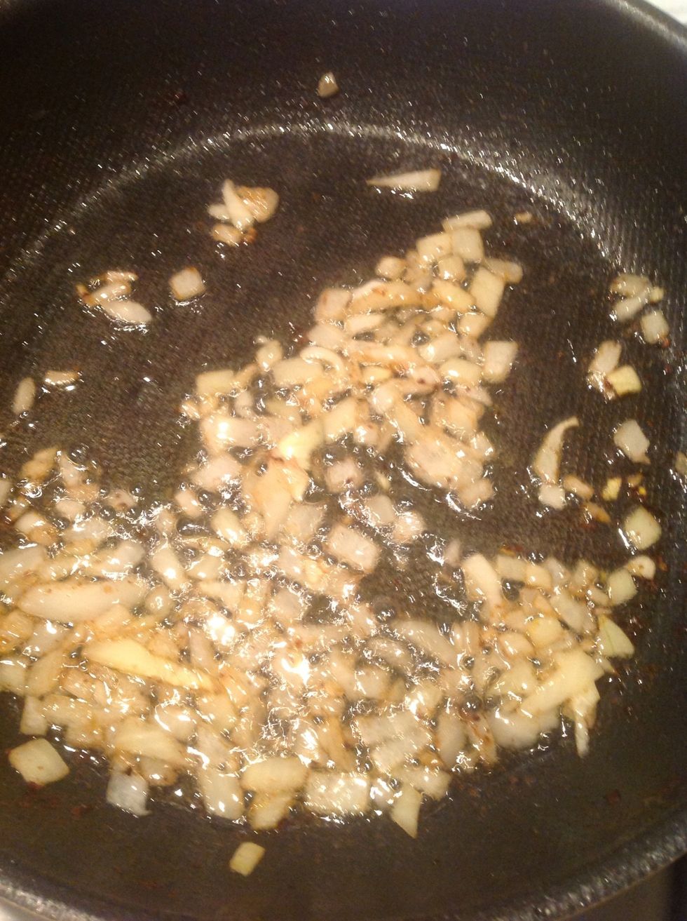 Make the orange sauce: Add minced onion to the pan with duck fat from last stage till it smells good