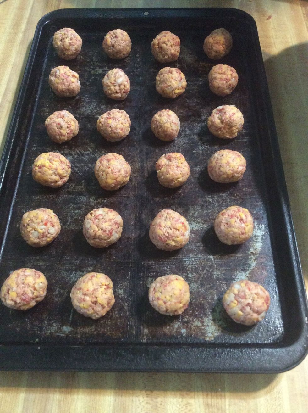 Make the sausage balls one inch in diameter with space in between them.