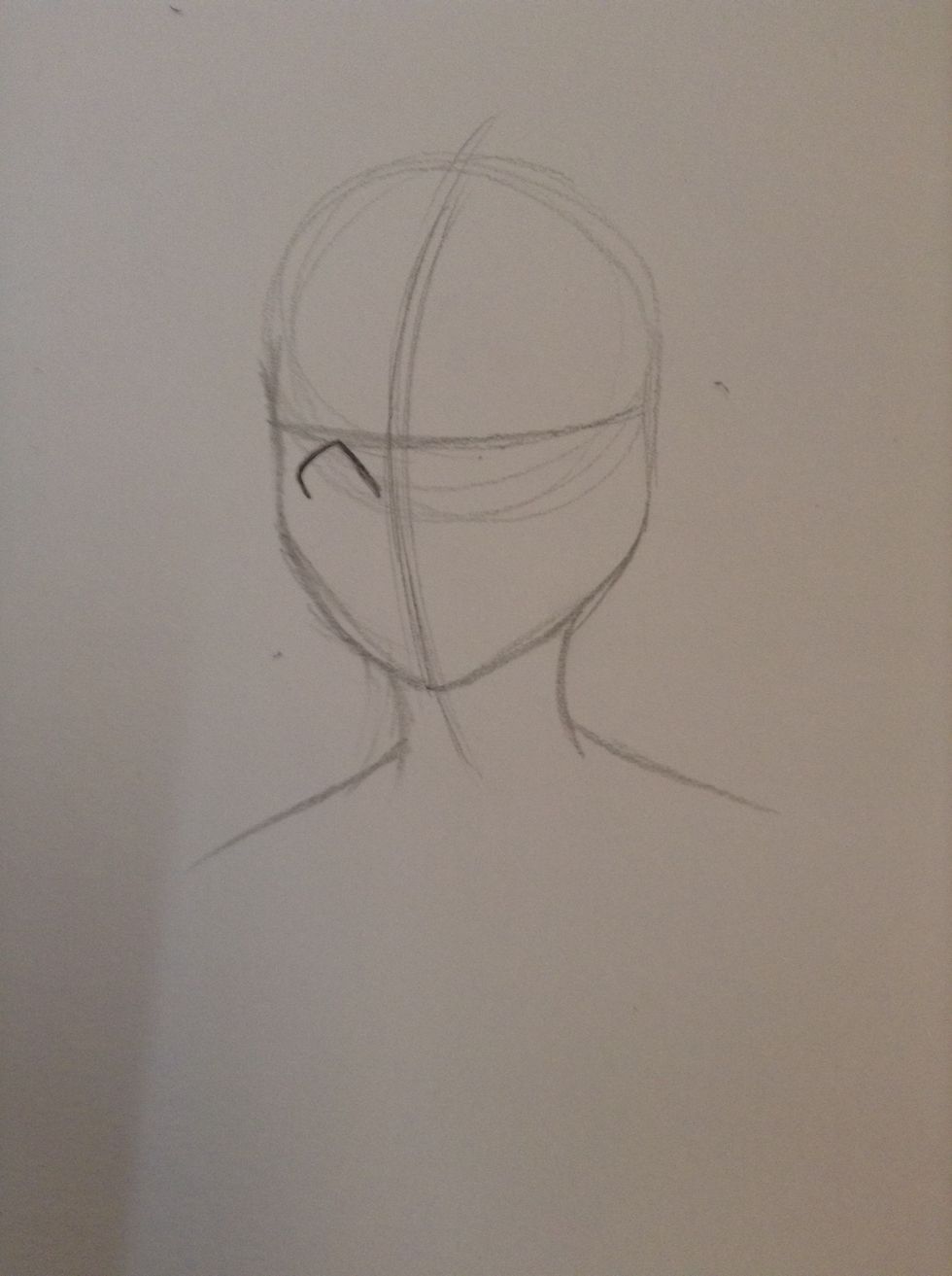 Make the shape of the first eye.