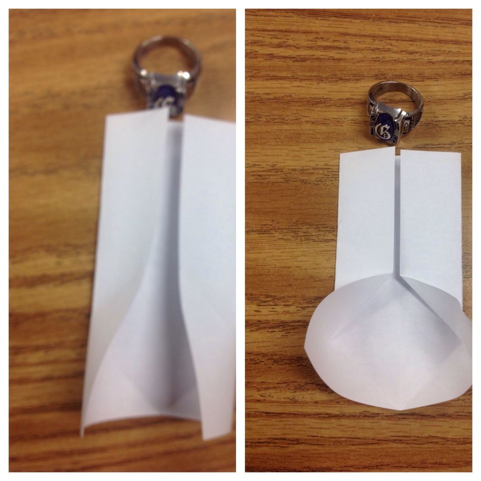 Make the two diagonal folds as shown, on the upper layers only.