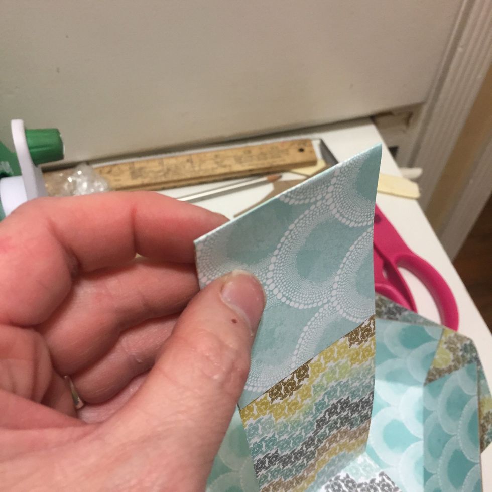 make to corner folds sharp! Wrap around and glue to outside