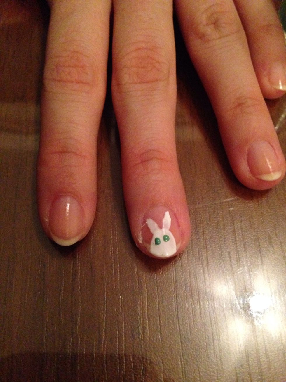 Make two dots with the blue or green polish as these will be the eyes. P.s. Don't use too much polish, it won't dry well and mess up your bunny.