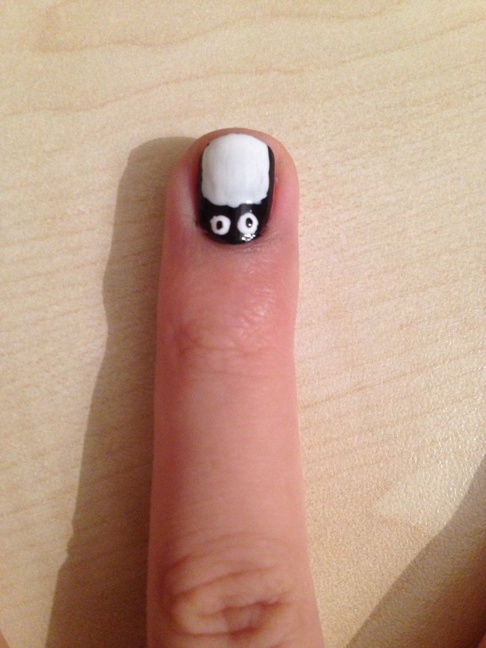 Make two little dots with black into the white ones, these are gonna be your penguin's eyes \ud83d\udc40