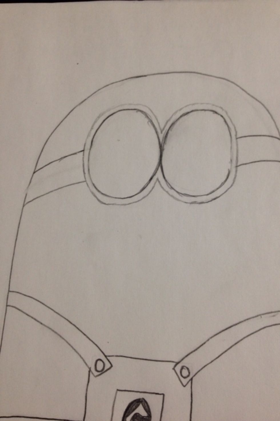 Make two long rectangular boxes for the straps of the glasses and the one on the right a little crooked going up. Then two circles for the lens