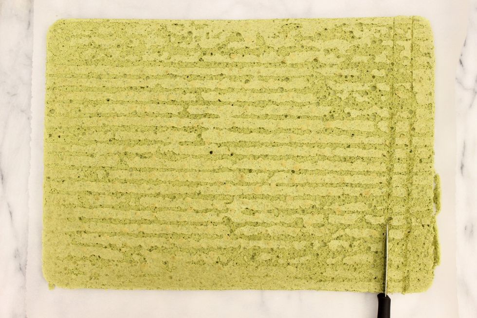 Make two SHALLOW cuts down the right side of the cake about 1 cm apart. Don't cut through the cake! Try to go straight and parallel to the cake's edge....and not crooked like I did haha.