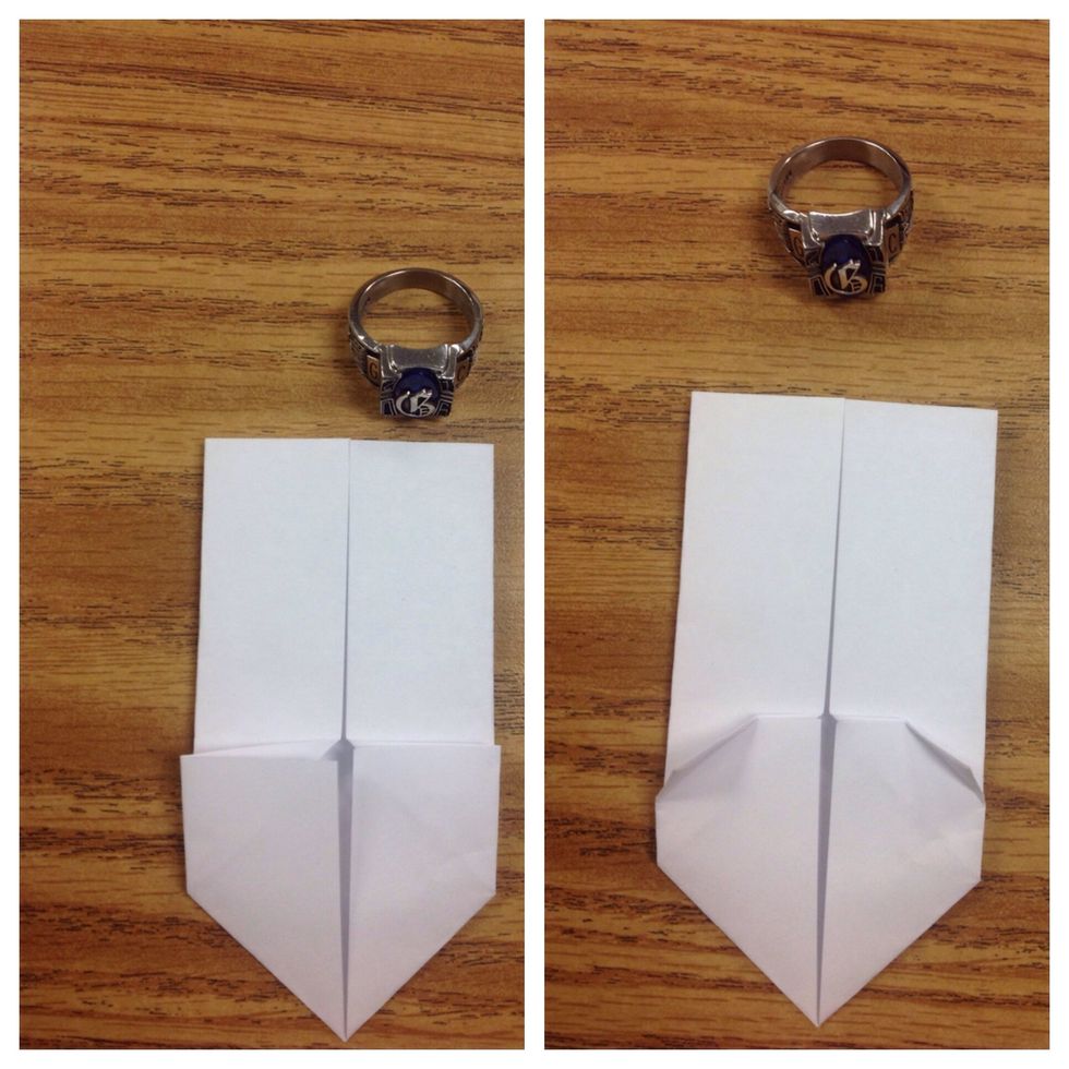 Make two small diagonal folds as shown. Crease well and unfold.