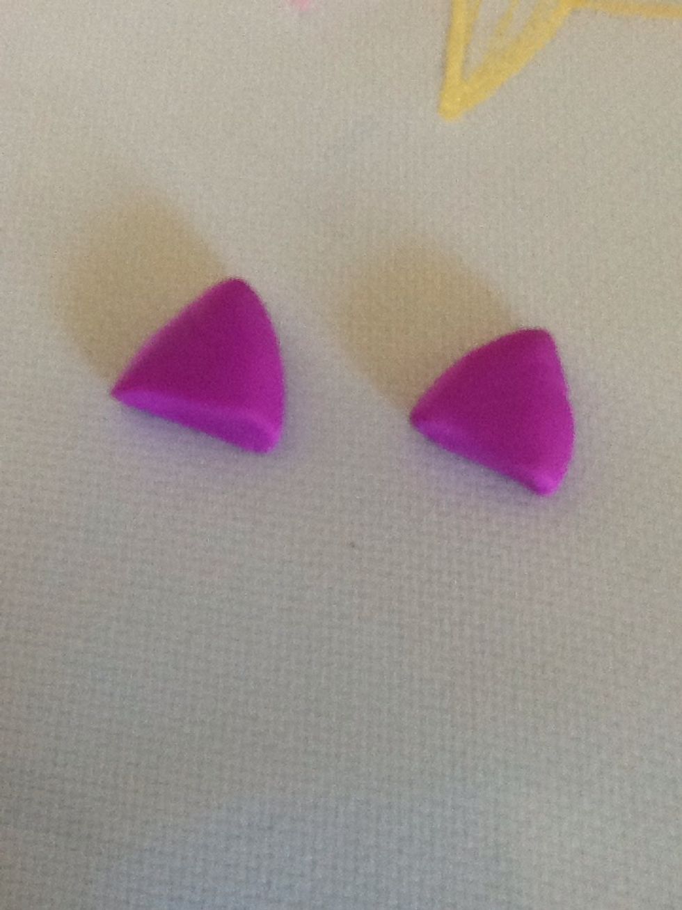 Make two triangles for the ears