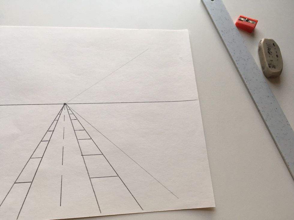 Make two very lightly drawn guidelines for your trees or poles.