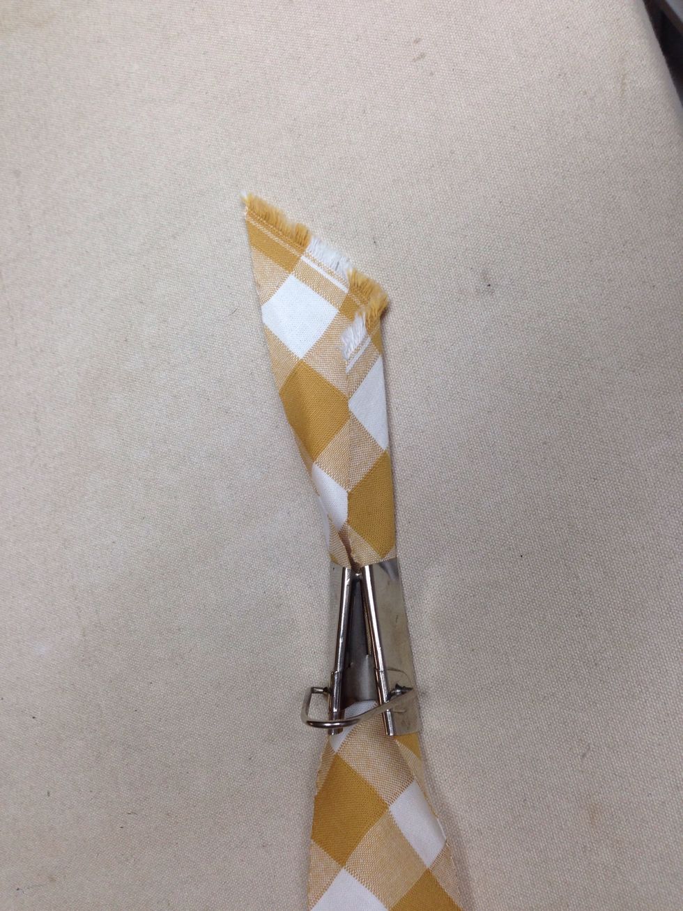 Make your bias banding using the Bias Tape Maker - Begin pulling the strip through the tape maker. See our website for a video http://www.patemeadows.com/Using-Bias-Tape-Makers_ep_62.html