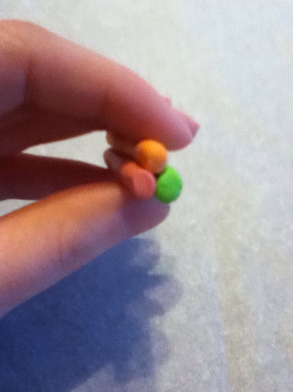 Make your filling. Here it's 'crab, carrot and avocado'. You can get really creative here, but contrasting colors show up the best in small beads.