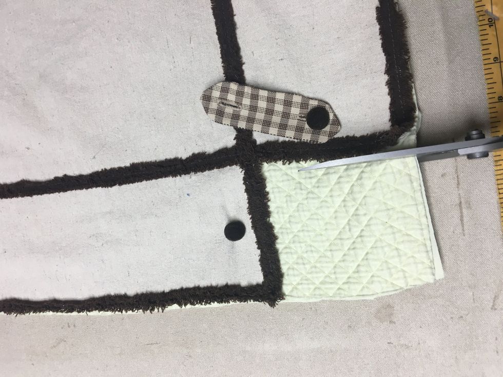 Make your first cut on back corners along the back flap/drop.  You want this cut to be 1/2" wider than the finished width on each side of the back flap/drop as shown .