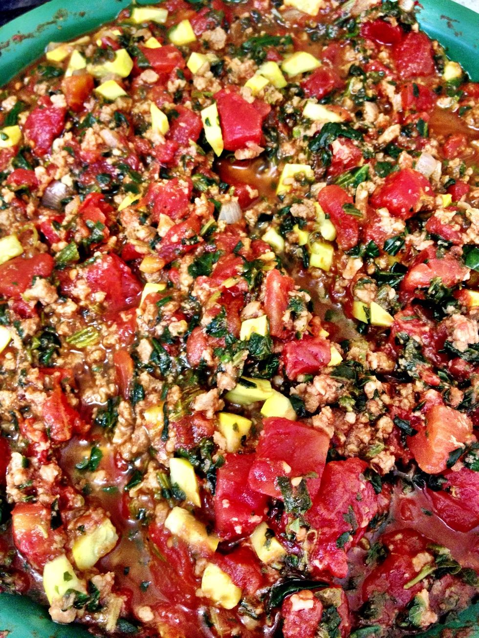 Make your pasta sauce. I used 2 large cans of diced tomatoes, half an onion, 1 yellow squash, a box of frozen spinach and 1lb meatless ground crumble. Haha. Sounds questionable, but it's good. \ud83d\ude0a