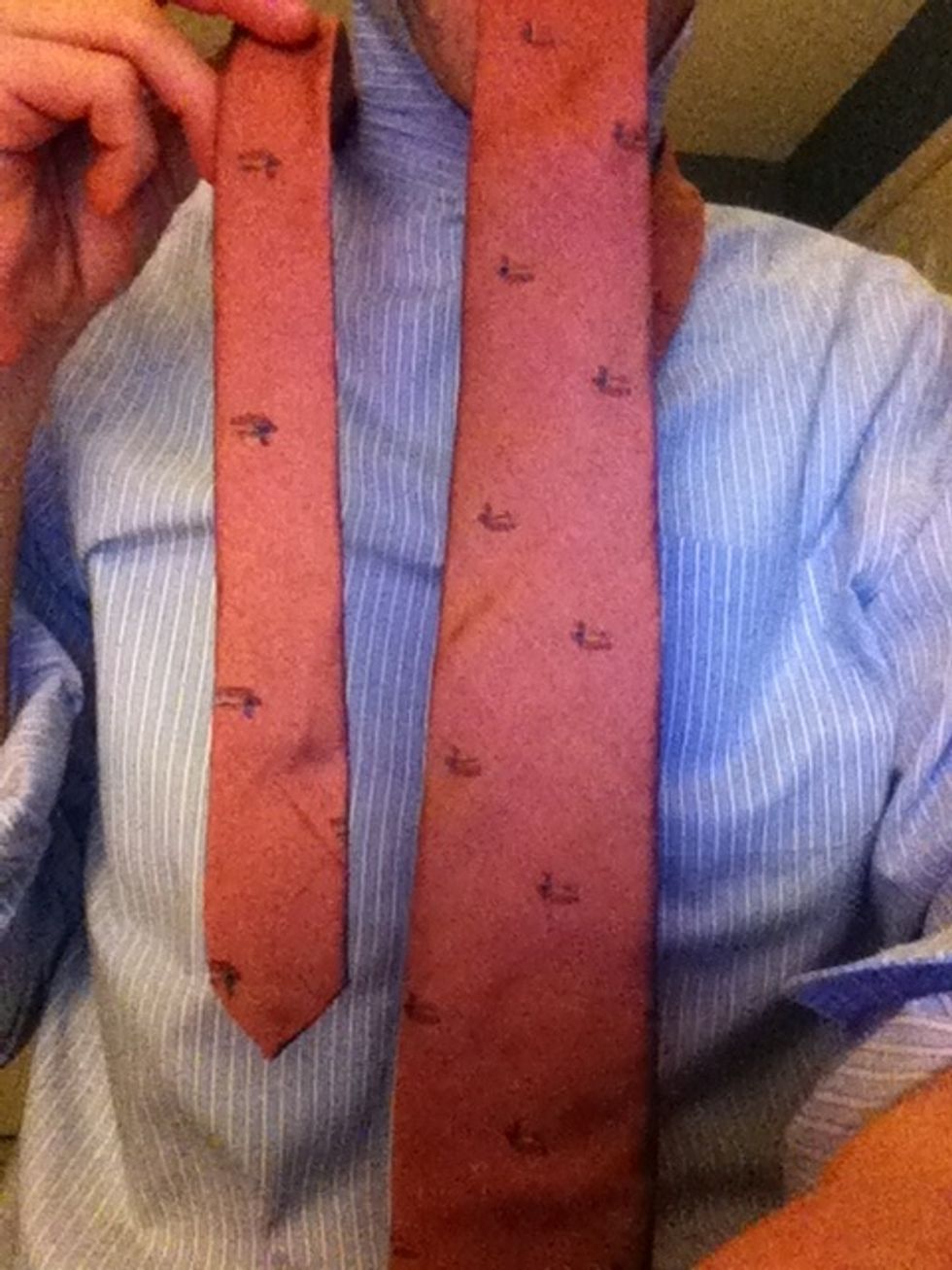 Make your tie so there is a thinner side to your right and the fatter side on your left. Have the thinner side about 1/4th the length of the fatter side.